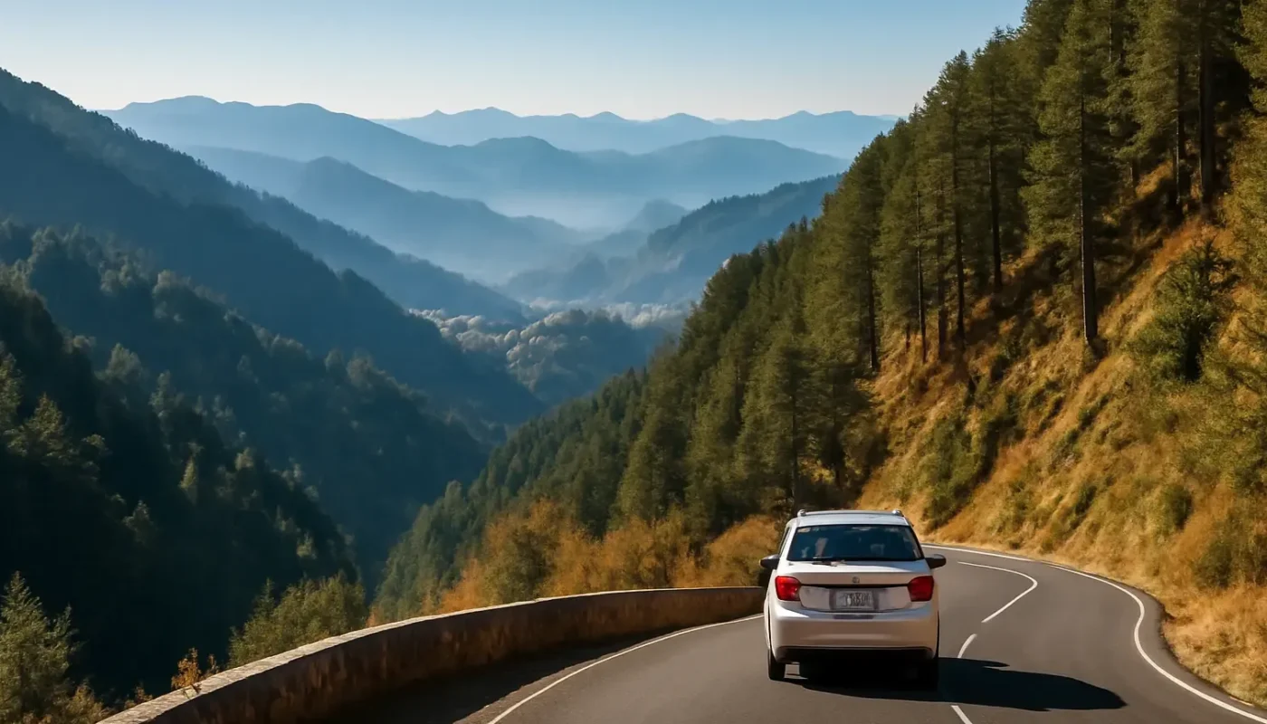 Winding road through pine hills on the approach to Shimla