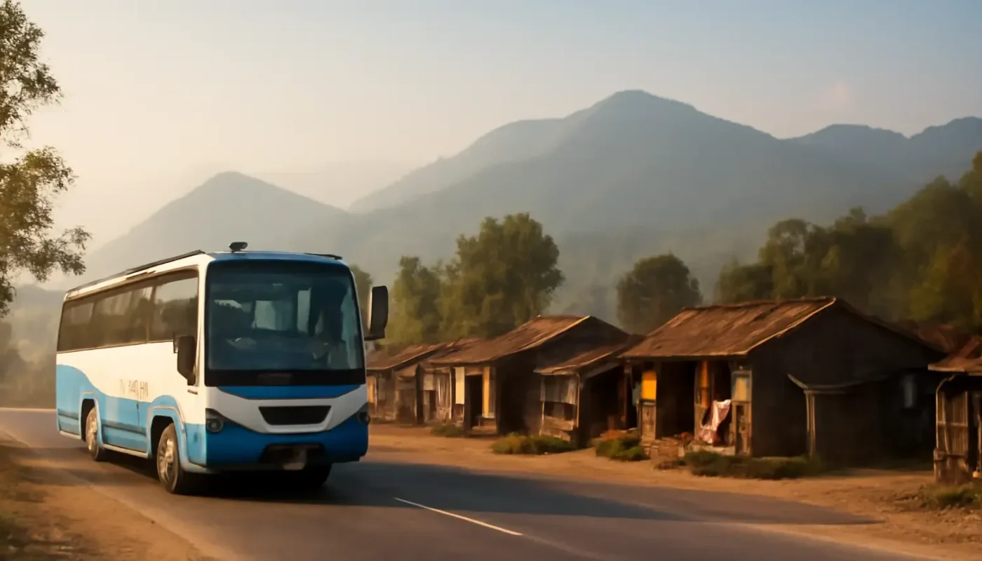 Road and bus near the India Nepal border with green Nepalese hills
