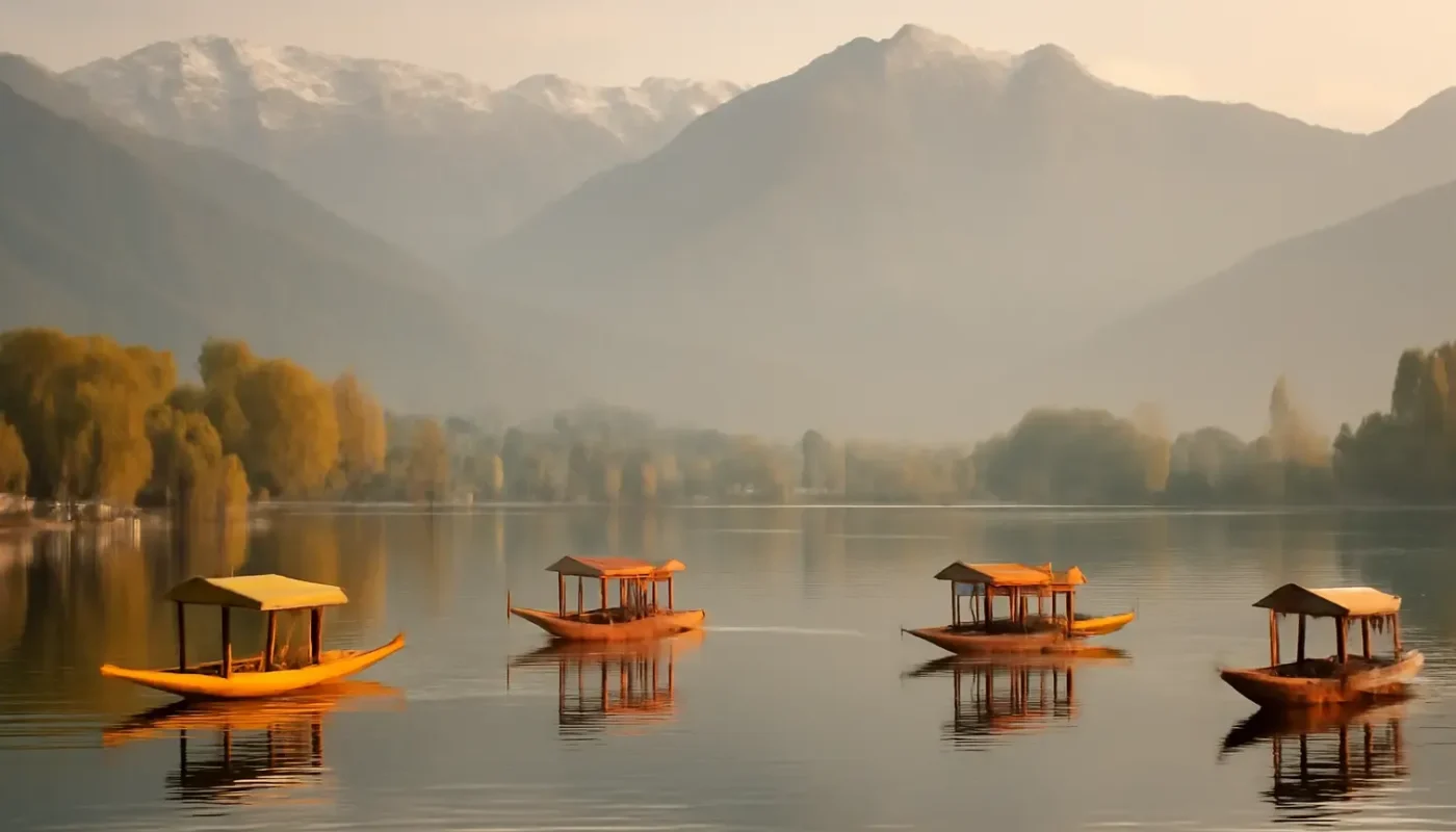 Shikaras on Dal Lake with Kashmir mountains in autumn light