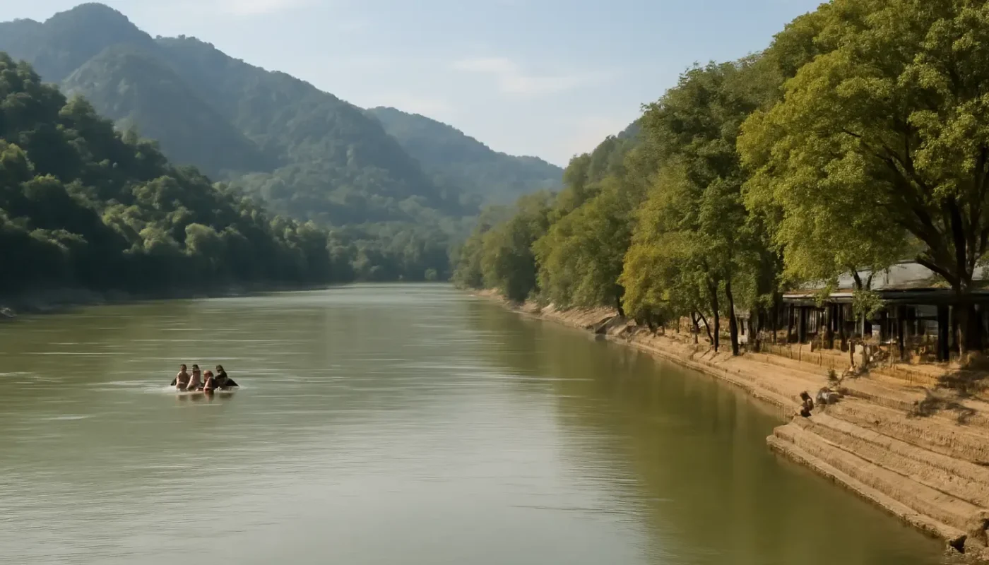 The Ganga and green hills near Rishikesh in morning light
