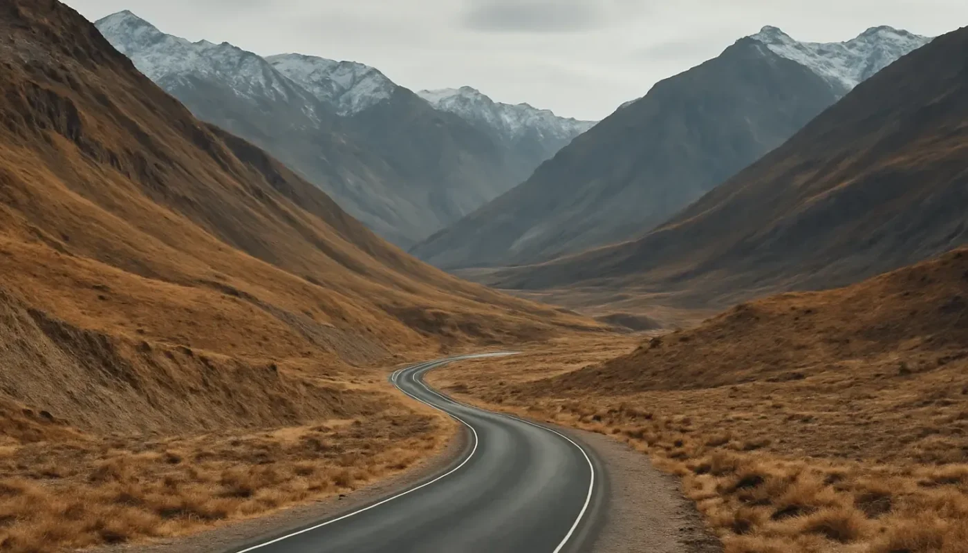 Mountain road winding through the autumn landscape of Spiti Valley